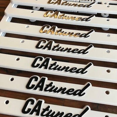 CAtuned License Plate Frame White w/ black lettering